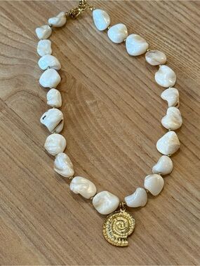 White beaded Necklace with Gold Spiral Pendant